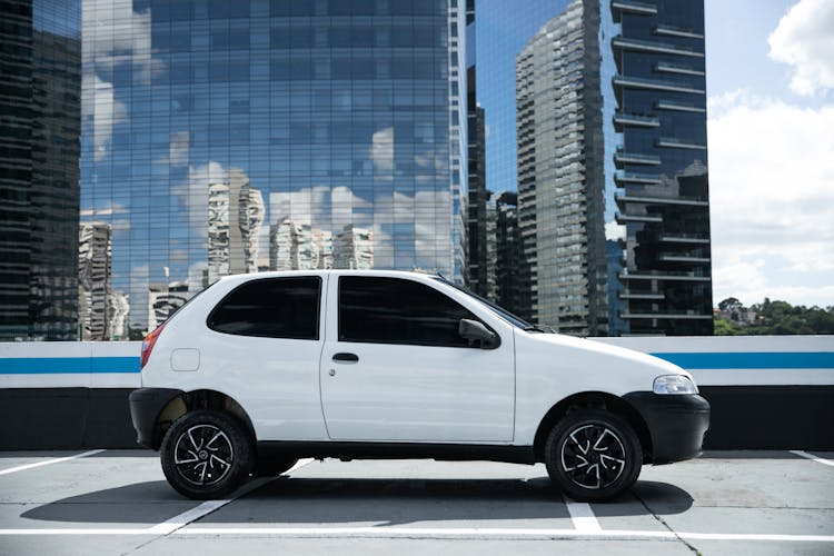 Side View Of A White Car 