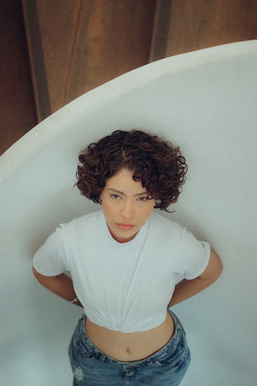 Model in White Blouse and Jeans