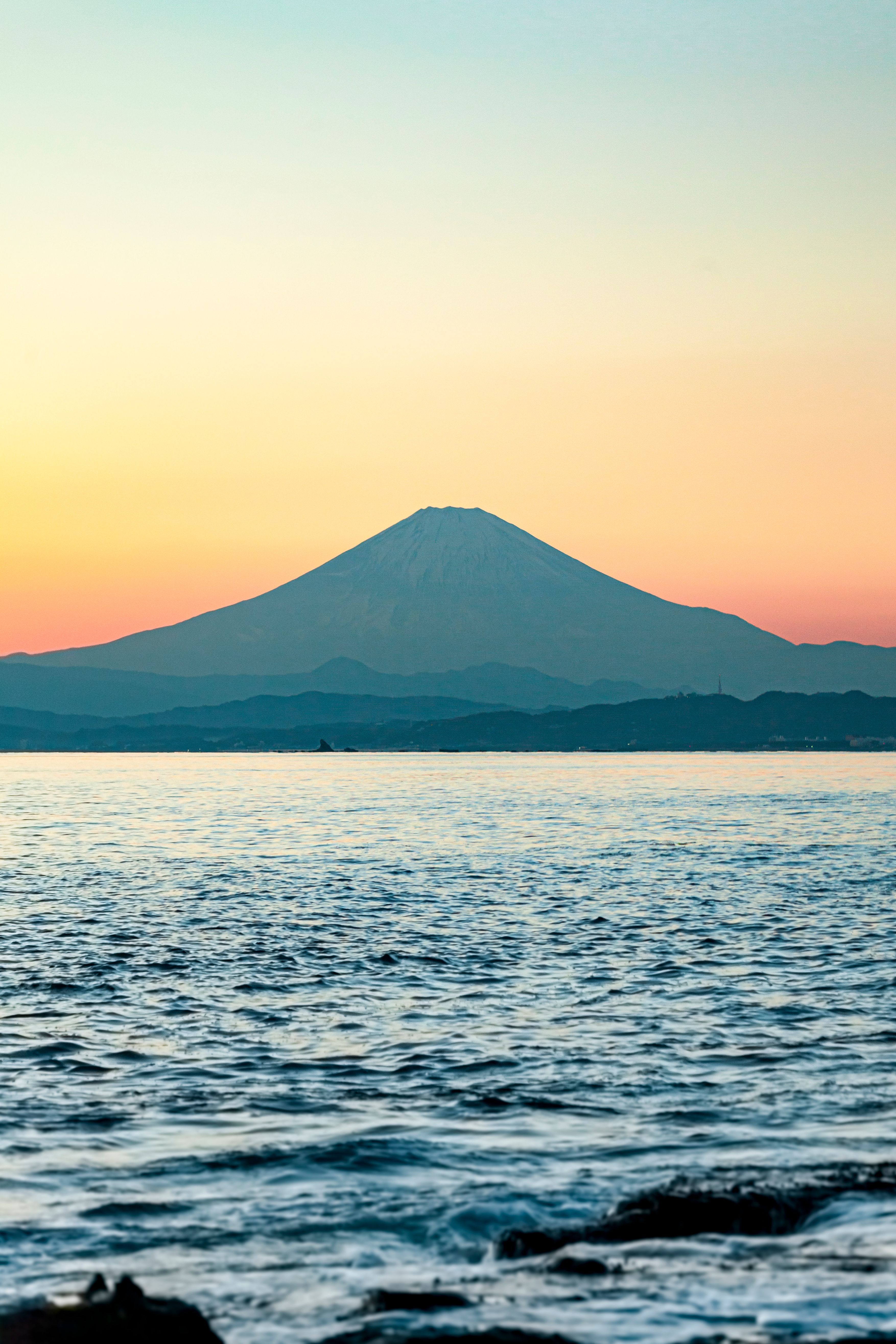 Yellow Sky over Sea at Sunset · Free Stock Photo