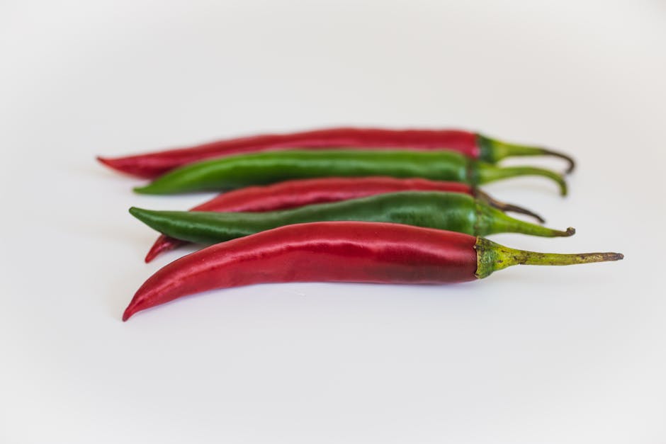 Two Green and Three Red Chili Peppers