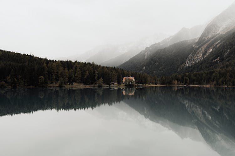 Mountainous Landscape Reflecting In Water 