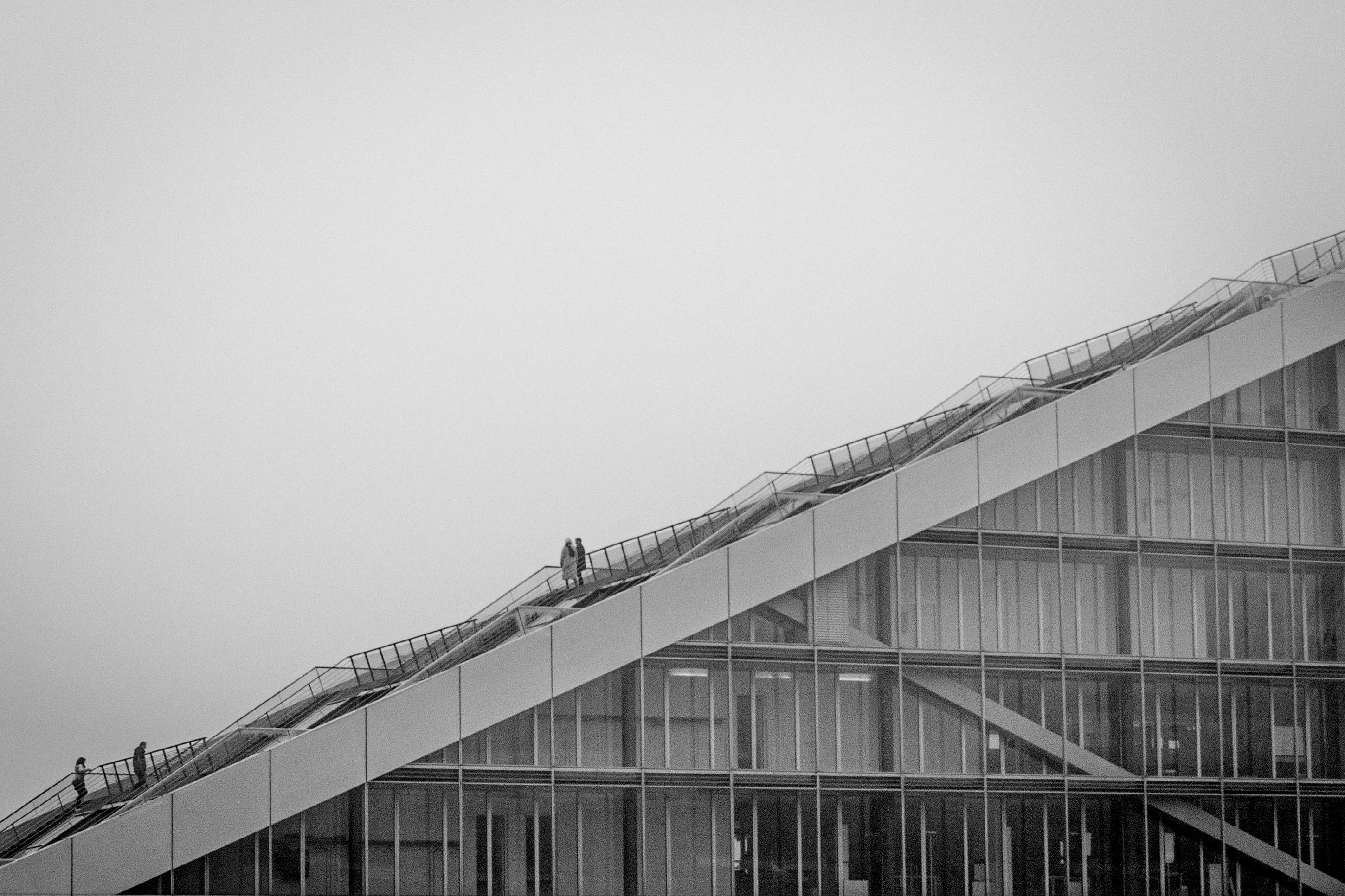 Black and white photo of a modern building with stairway in Hamburg.