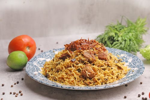 Mouthwatering Biryani Meal on Ceramic Plate