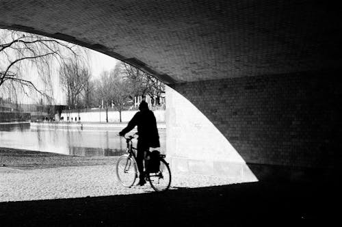 A Biker Passing Through a Tunnel