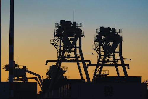 Gratis stockfoto met containervrachten, gouden uur, havenhijskranen