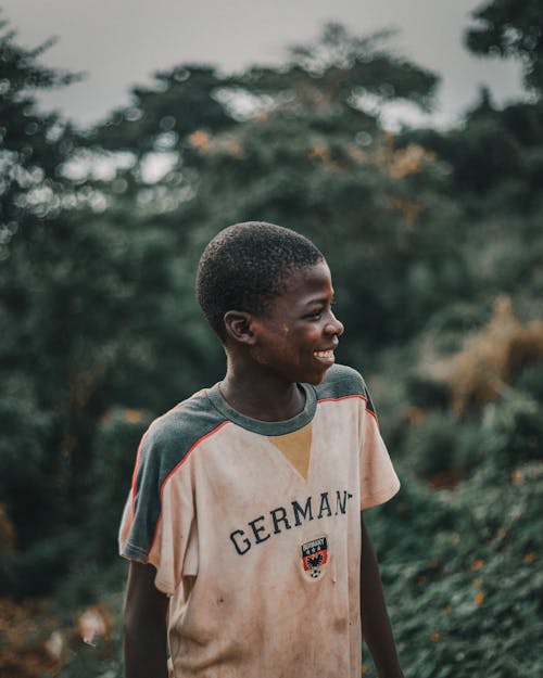 Smiling Boy Wearing Crew Neck T-Shirt