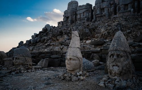 Free Mount Nemrut's weathered ancient statues, a UNESCO World Heritage Site in Türkiye. Stock Photo
