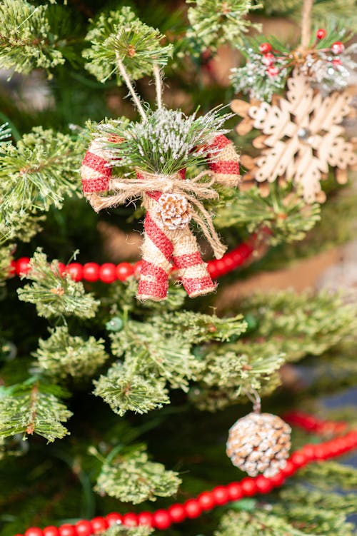 Christmas Decorations Hanging on Christmas Tree