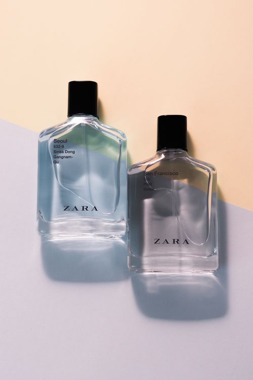 Free Stylish Zara perfume bottles on a minimalist pastel backdrop, perfect for showcasing fragrance elegance. Stock Photo
