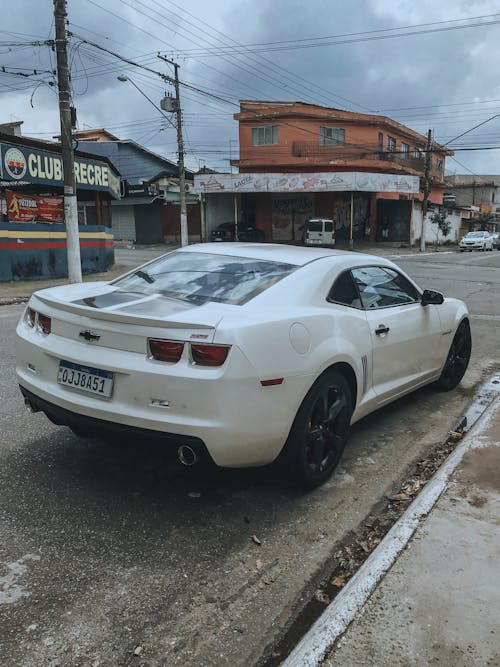 White Chevrolet Car Parked on Road 