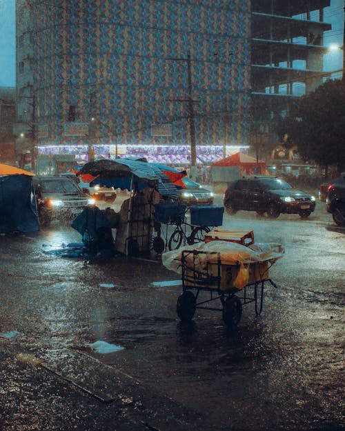 Merchant Stalls in Pouring Rain