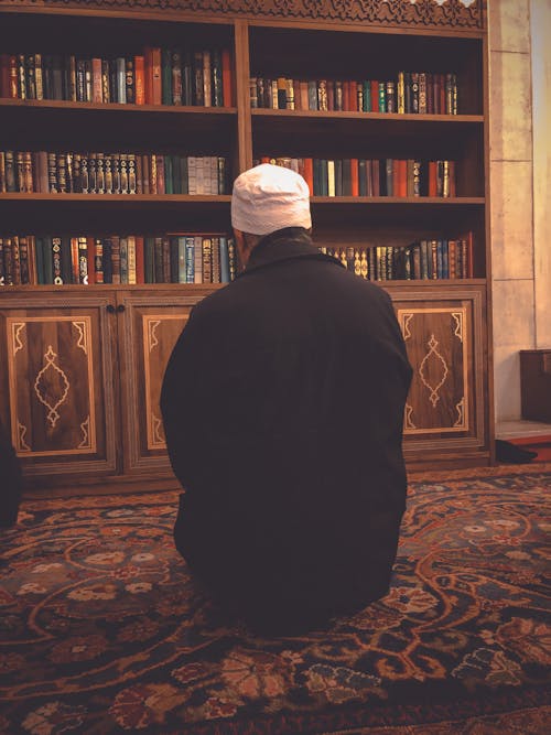 Man while Praying in Library