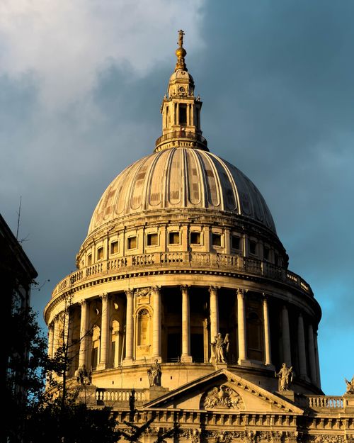 Free Stunning view of St Paul's Cathedral dome in London with dramatic sky. Stock Photo