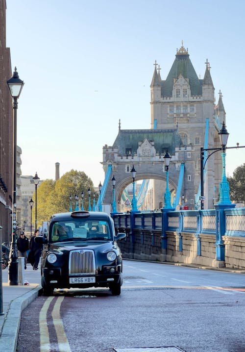 Taxi against Tower Bridge 