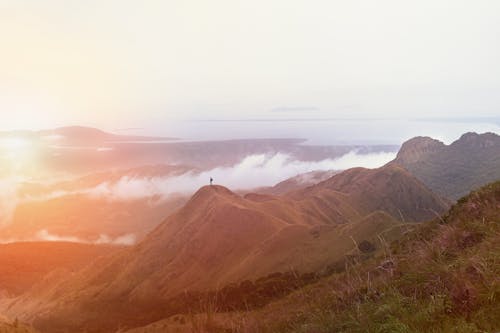 Person on Hills at Sunset