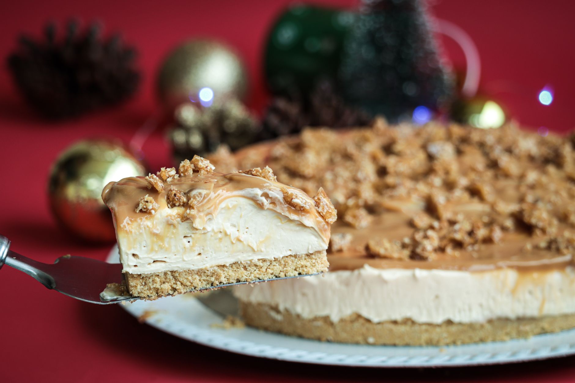 Close up image of vegan cheesecake on a rustic wooden table