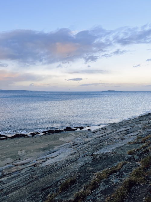 Aerial View or Rocky Shore Near Sea