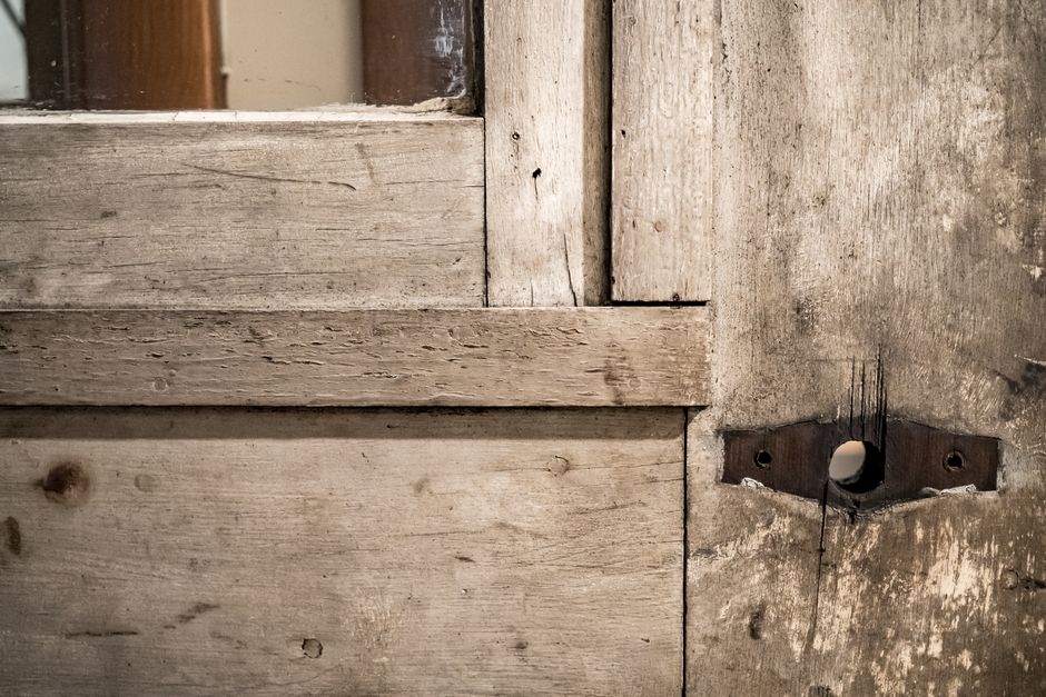 Close-up of corroded window hinges and a stripped crank handle mechanism - casement window repair NJ Close-up of corroded window hinges and a stripped crank handle mechanism - casement window repair NJ