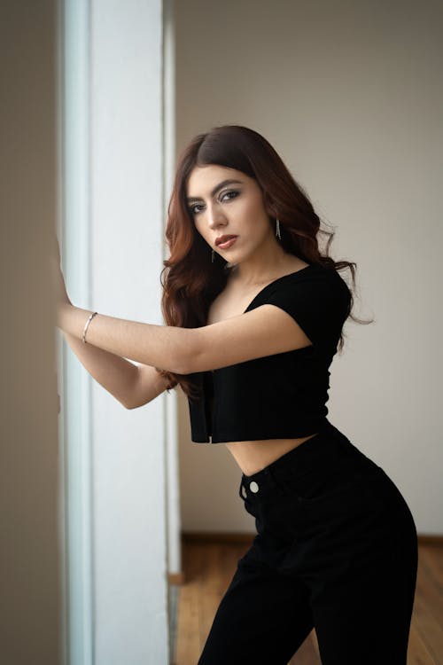 Portrait of a Woman Wearing Black Crop Top