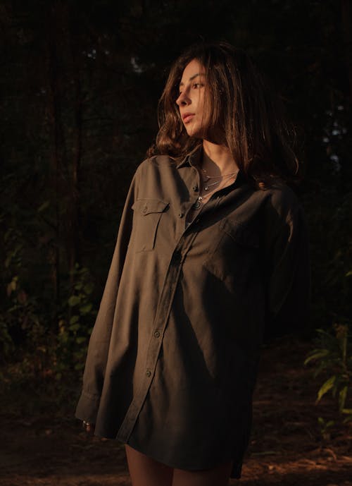 Woman in Black Long Sleeves Looking Sideways 