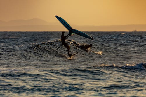 Photos gratuites de faire signe, individu, kite surf