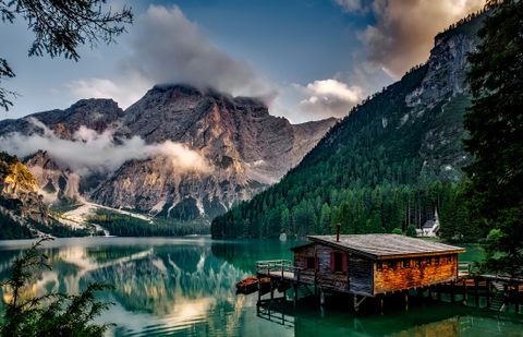 Soft sunrise light over a quiet mountain valley