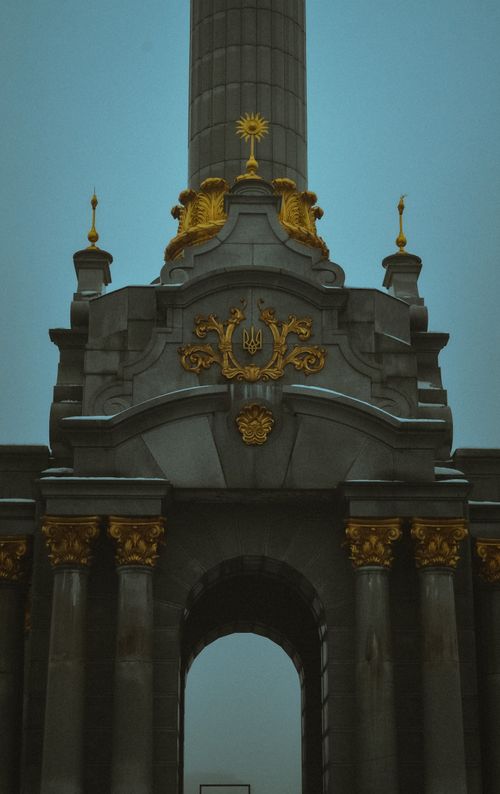 Free Detail of Independence Monument in Kyiv, Ukraine featuring ornate columns and emblematic decor. Stock Photo