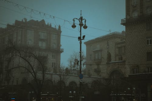 Dark Photo of an Old Town in Mist