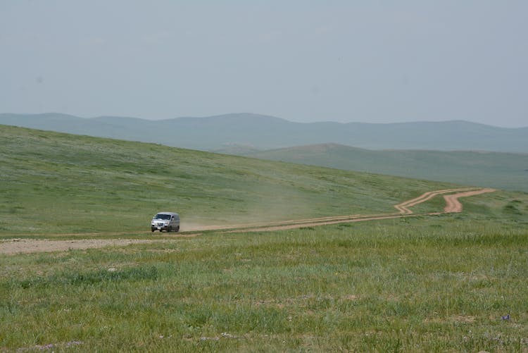 Car Running On A Rural Road