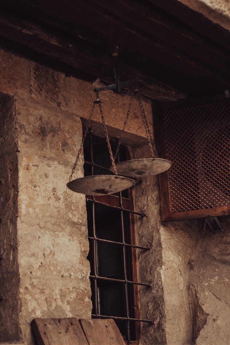 Dirty Pan Balance Hanging On Wall