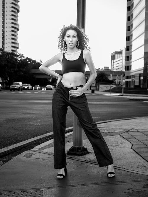 Grayscale Photo of Woman Wearing Crop Top