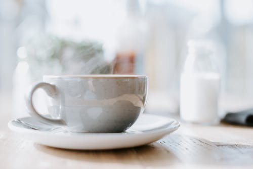 Kostnadsfri bild av kaffe, kopp och tefat, närbild