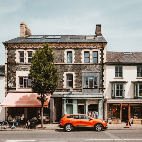 Car Parked in front of a Building 