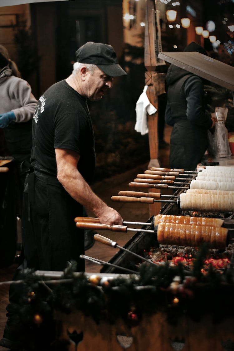 Man Cooking Food On Festival