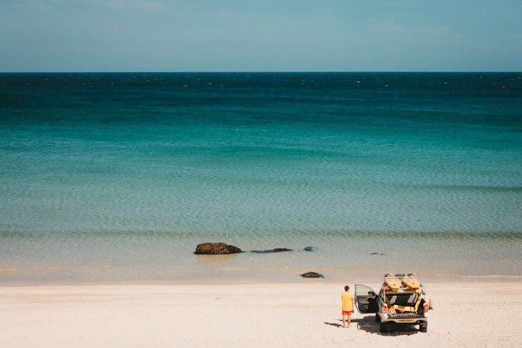 Lifeguard Standing On A Beach 