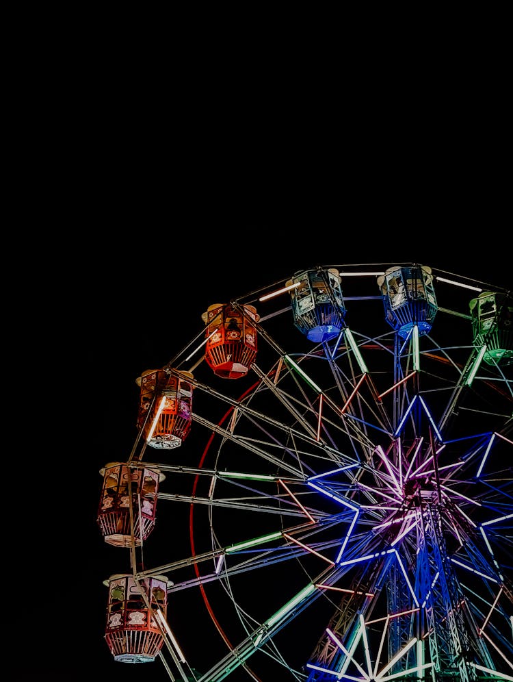 Illuminated Ferris Wheel During Night Time