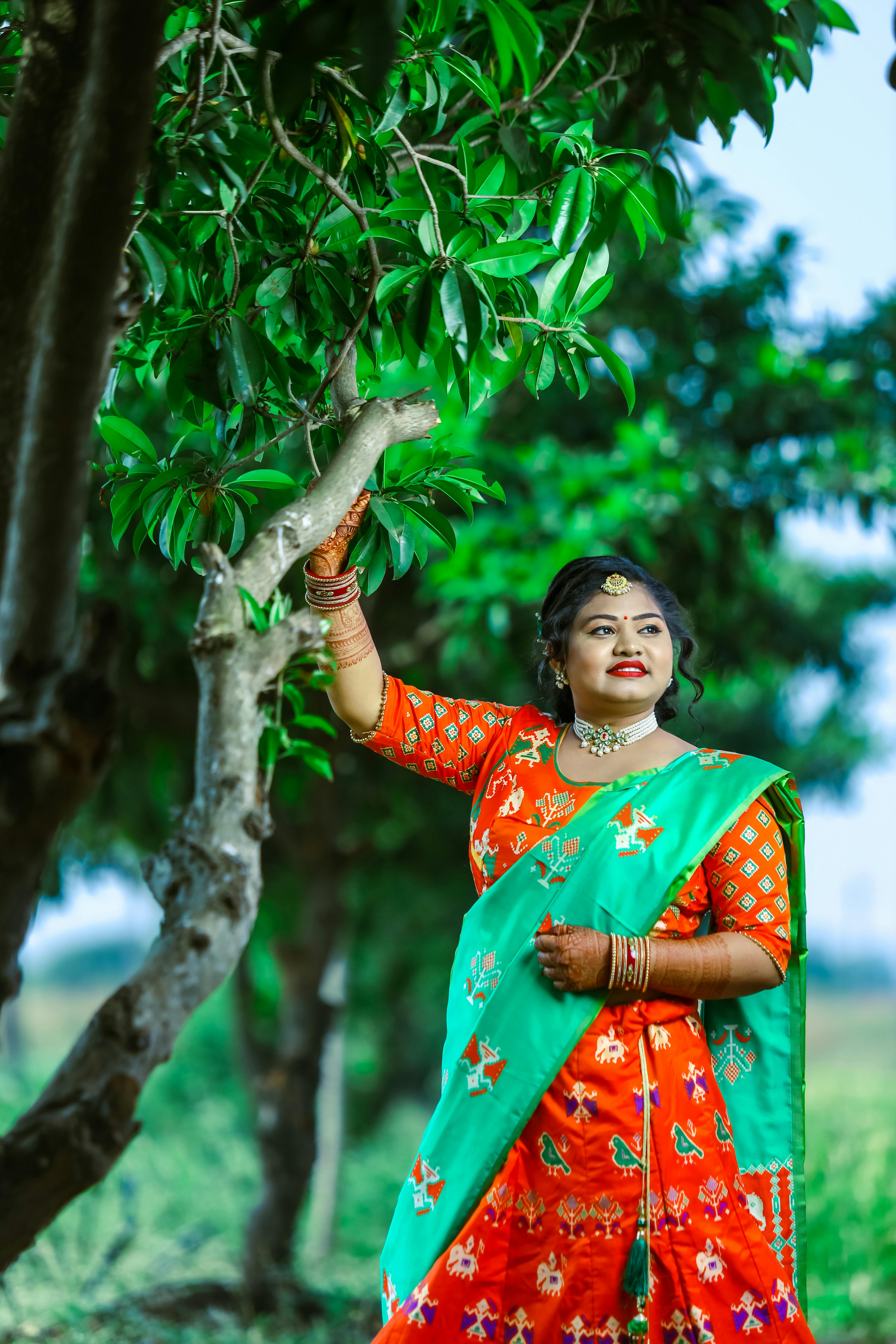 Portrait of a Beautiful Woman in Green Saree · Free Stock Photo