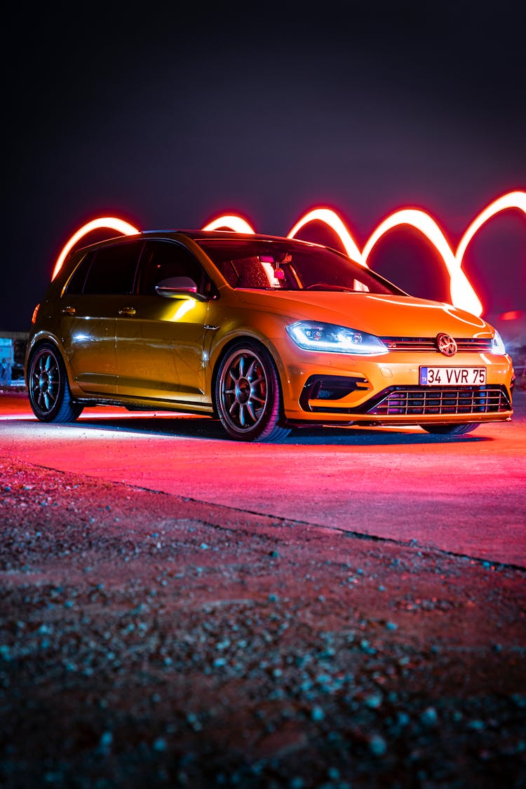 Car Illuminated At Night