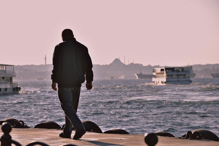 Fisherman On Pier