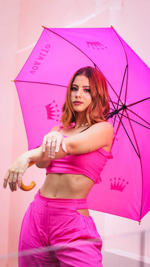 A Woman in Pink Crop Top and Pink Pants