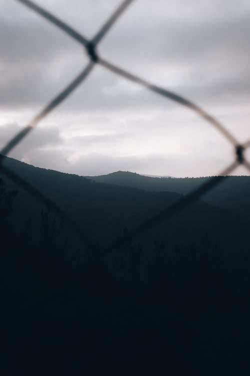 Mountainous Landscape behind the Fence 