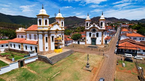 Free Discover the stunning colonial churches in Mariana, Brazil from a unique aerial perspective. Stock Photo