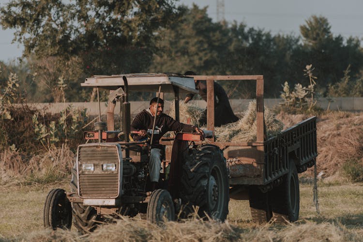 Man In A Tractor On A Field 