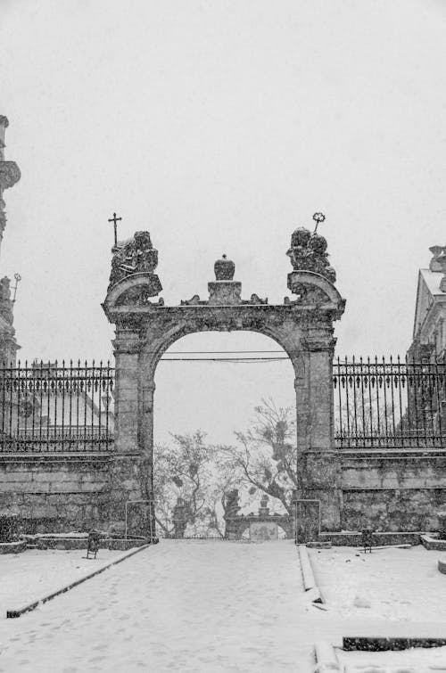 Grayscale Photo of an Arch in Lviv, Ukraine