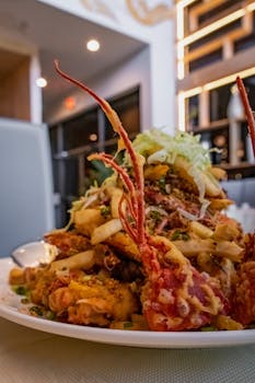 A visually striking gourmet seafood platter featuring a lobster, captured indoors with elegant decor.
