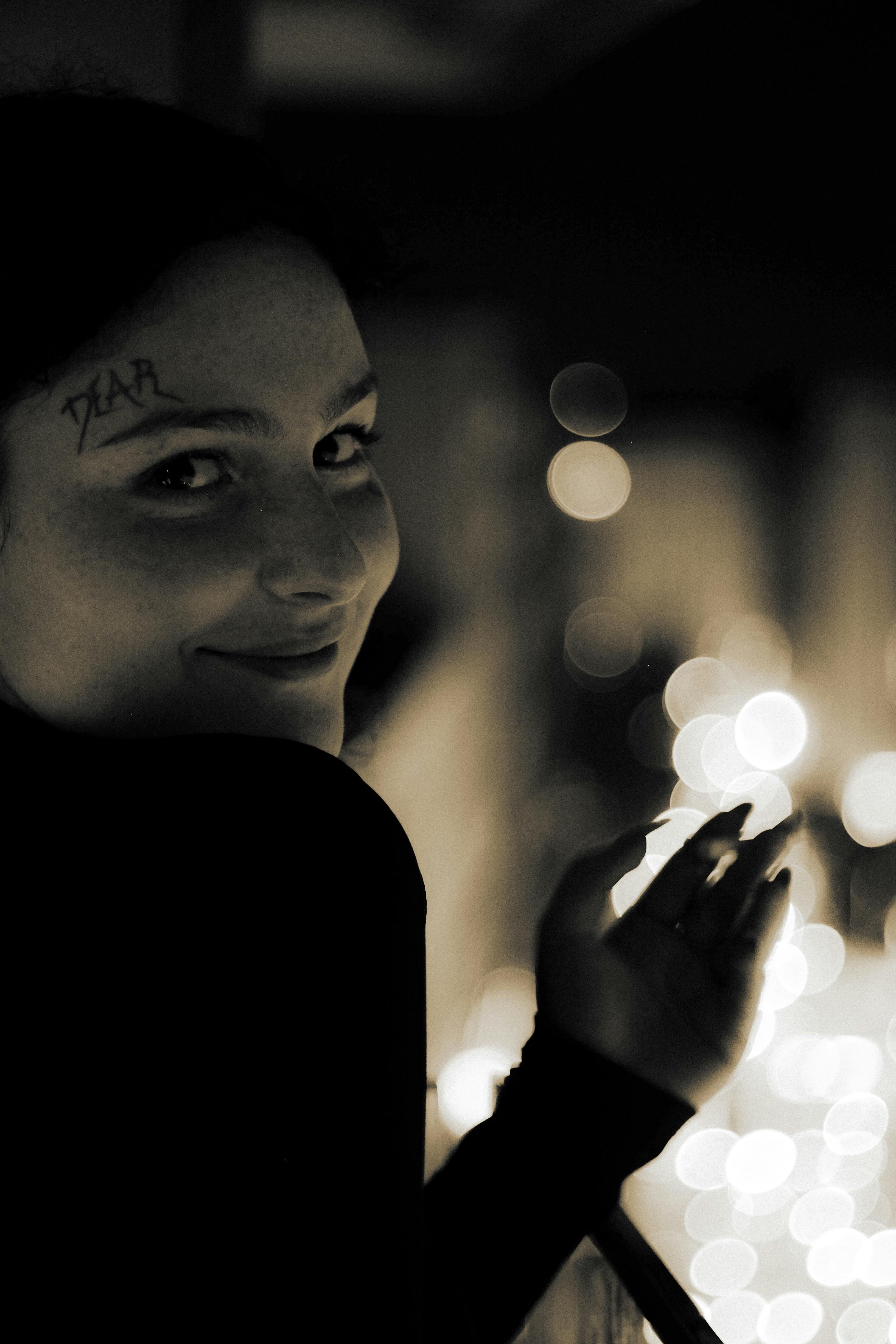 Monochrome Photo of Woman with Face Tattoo · Free Stock Photo