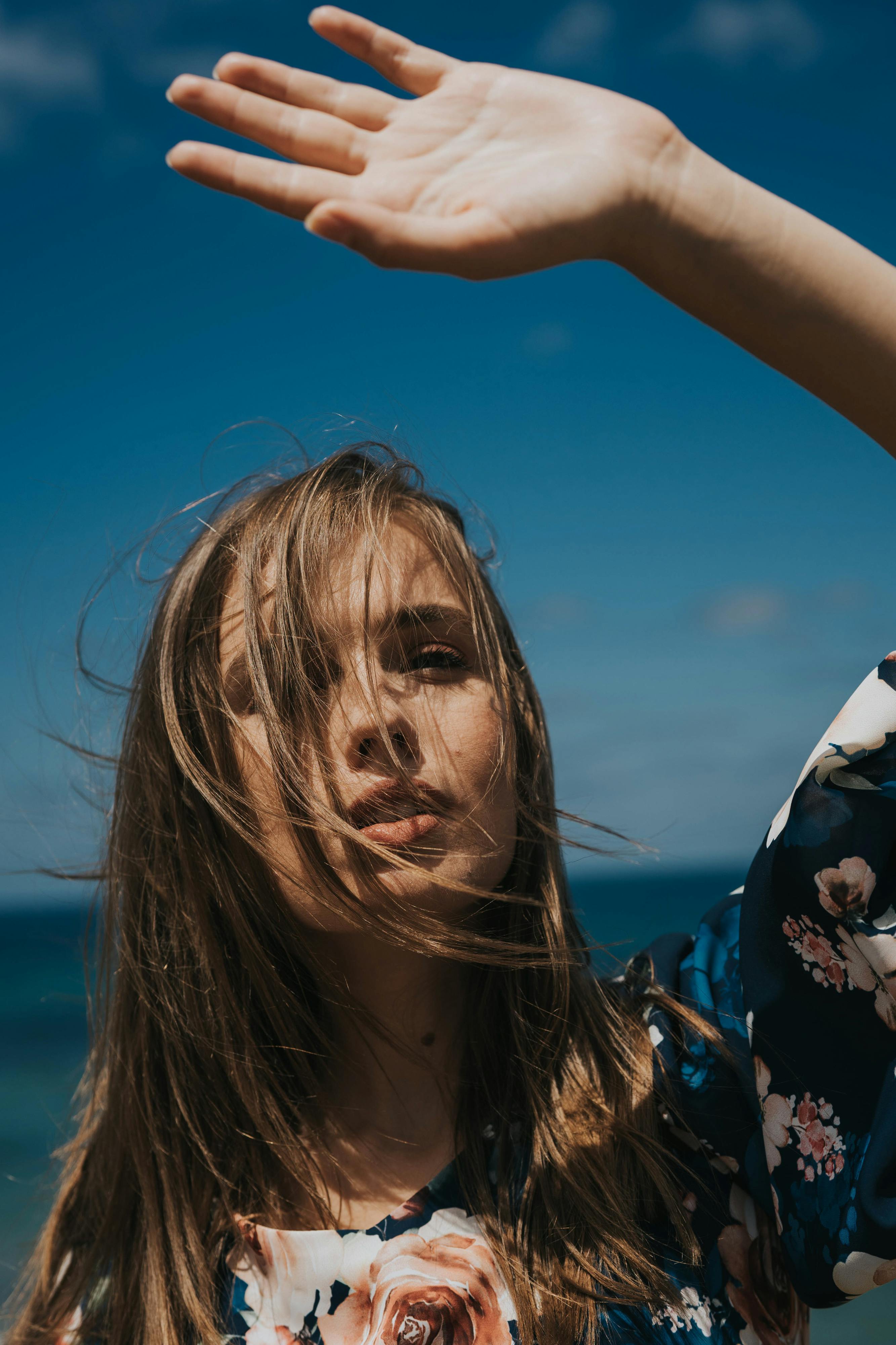 Photo of Woman Covering Face with Her Hair. · Free Stock Photo