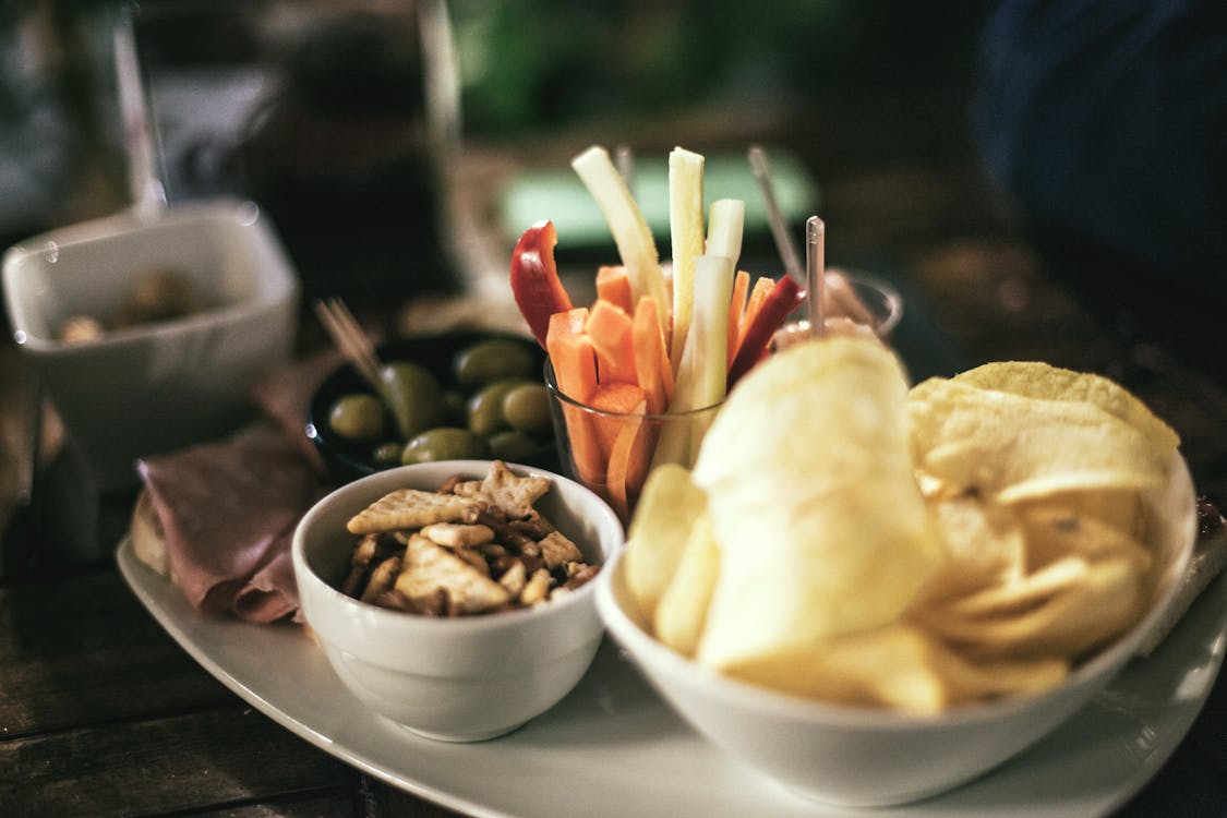 Chips in Bowl Beside Spices