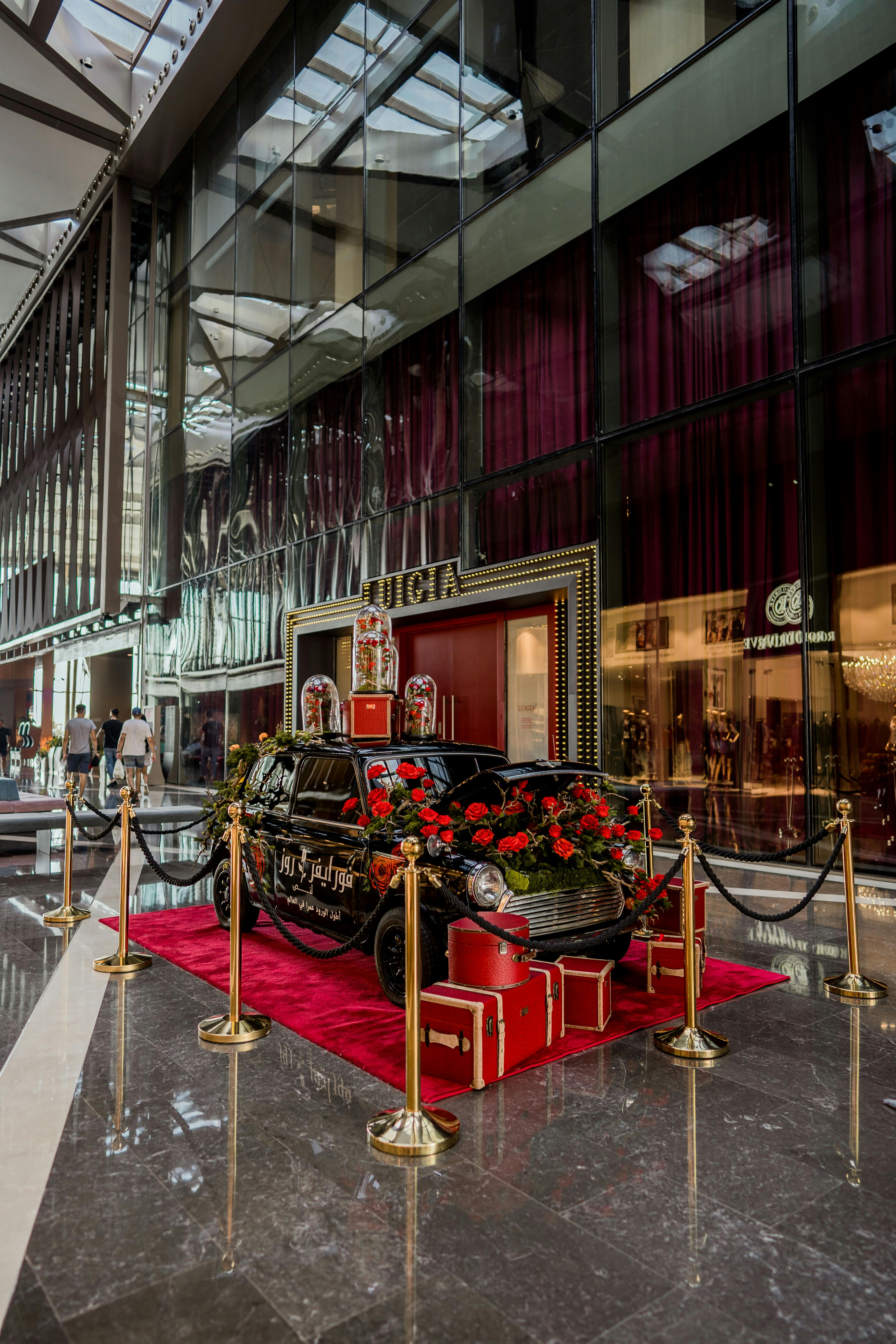 a large red carpet is in front of a building