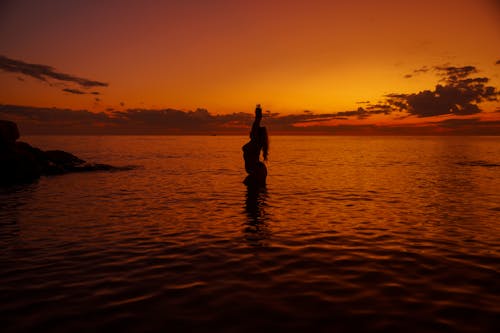 Бесплатное стоковое фото с багровое небо, вид сбоку, вода